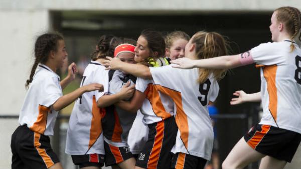 Camden Tigers' U-12 Girls celebrate their passage to the PUMA Champion of Champions final.