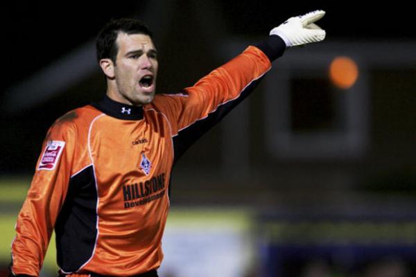 Pogliacomi hangs up his gloves