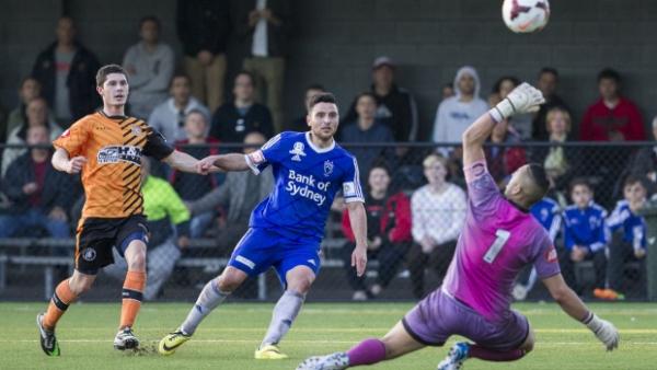 Hatzimouratis opens the scoring for Sydney Olympic on their way to the Preliminary Final.