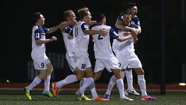 Palm Beach Sharks players celebrate scoring through Daniel Dragicevic.
