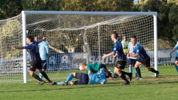Bayswater’s Paul McCarthy equalising against Sorrento.