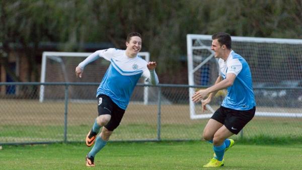 Chris Lucas celebrates scoring the goal that secured Palm Beach Sharks the Premiership.