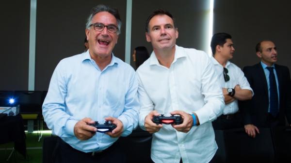 Michael Ephraim and Ante Milicic take some time out at the launch to test their skills on a PlayStation 4.