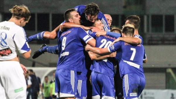 South Melbourne players celebrate what proved the winner against Oakleigh Cannons