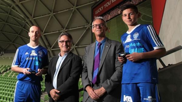 Michael Ephraim, Managing Director, Sony Computer Entertainment Australia and FFA CEO David Gallop with South Melbourne captain Michael Eager and U12 player Adam Brigo